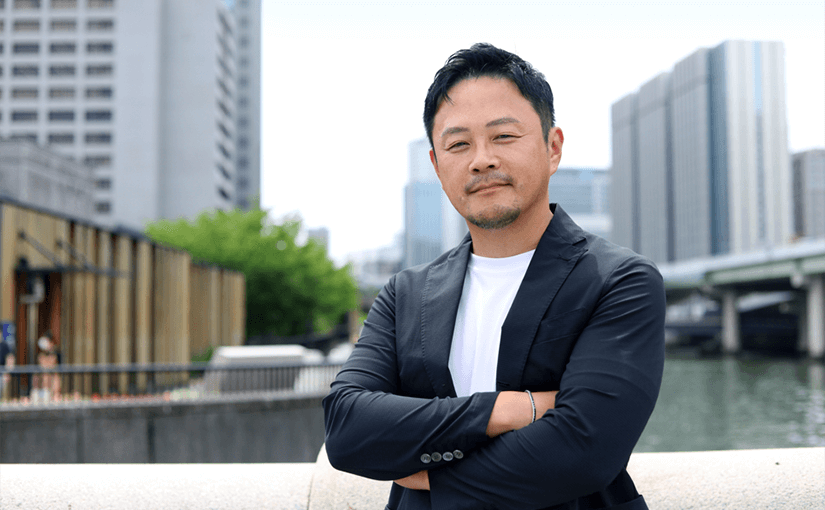 カコムスホールディングス株式会社 代表取締役会長兼社長 清水卓の写真